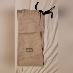Two Gucci dust bags